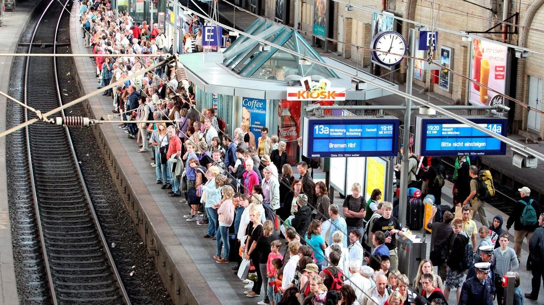 A crowded platform at a German train station